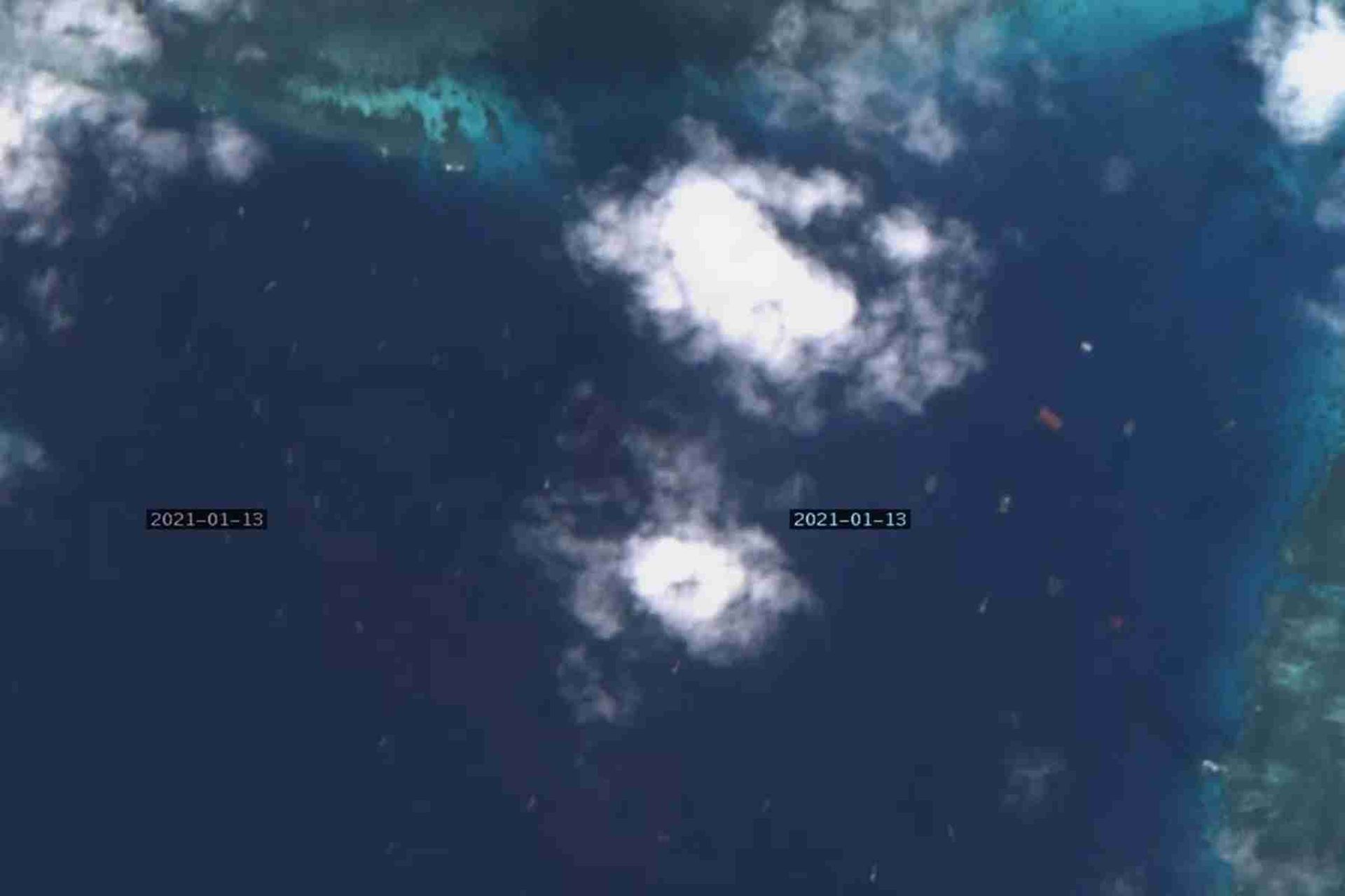 牛轭礁1月13日的卫星图,其附近集结大量船只。(微博@iversonliu) 牛轭礁1月13日的卫星图,其附近集结大量船只。(微博@iversonliu)