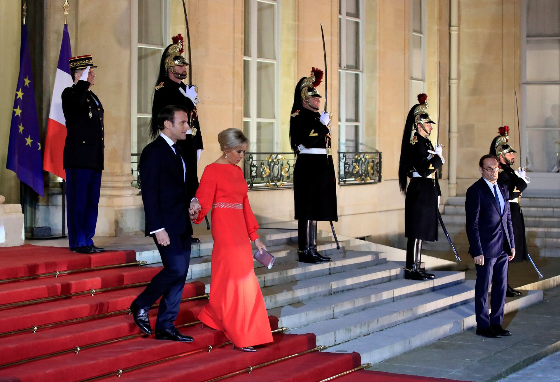 2019年3月25日，法国总统马克龙和夫人迎接中国国家主席习近平和夫人彭丽媛。（Reuters）