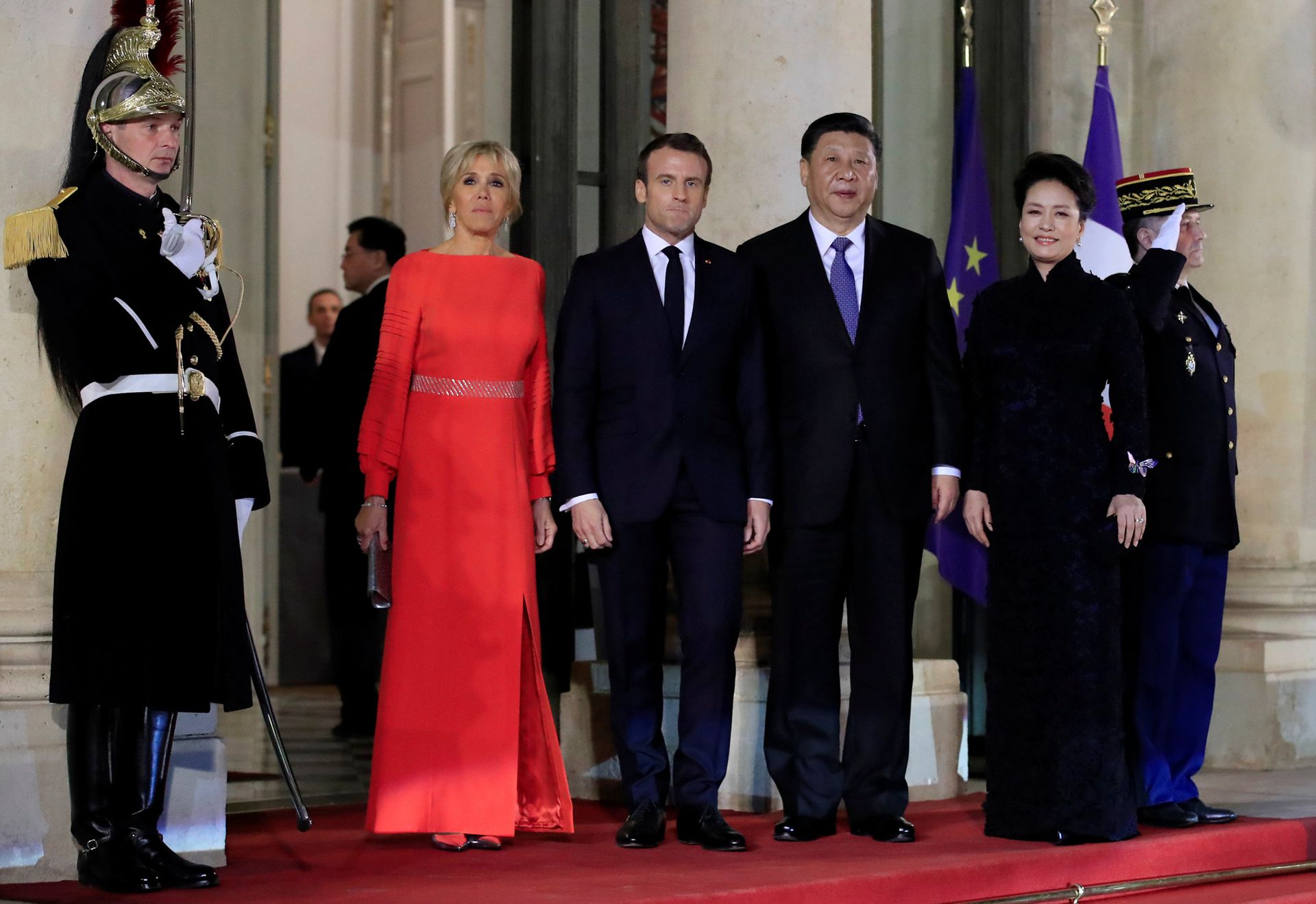 2019年3月25日，法国总统马克龙夫妇和中国国家主席习近平夫妇合影。（Reuters）
