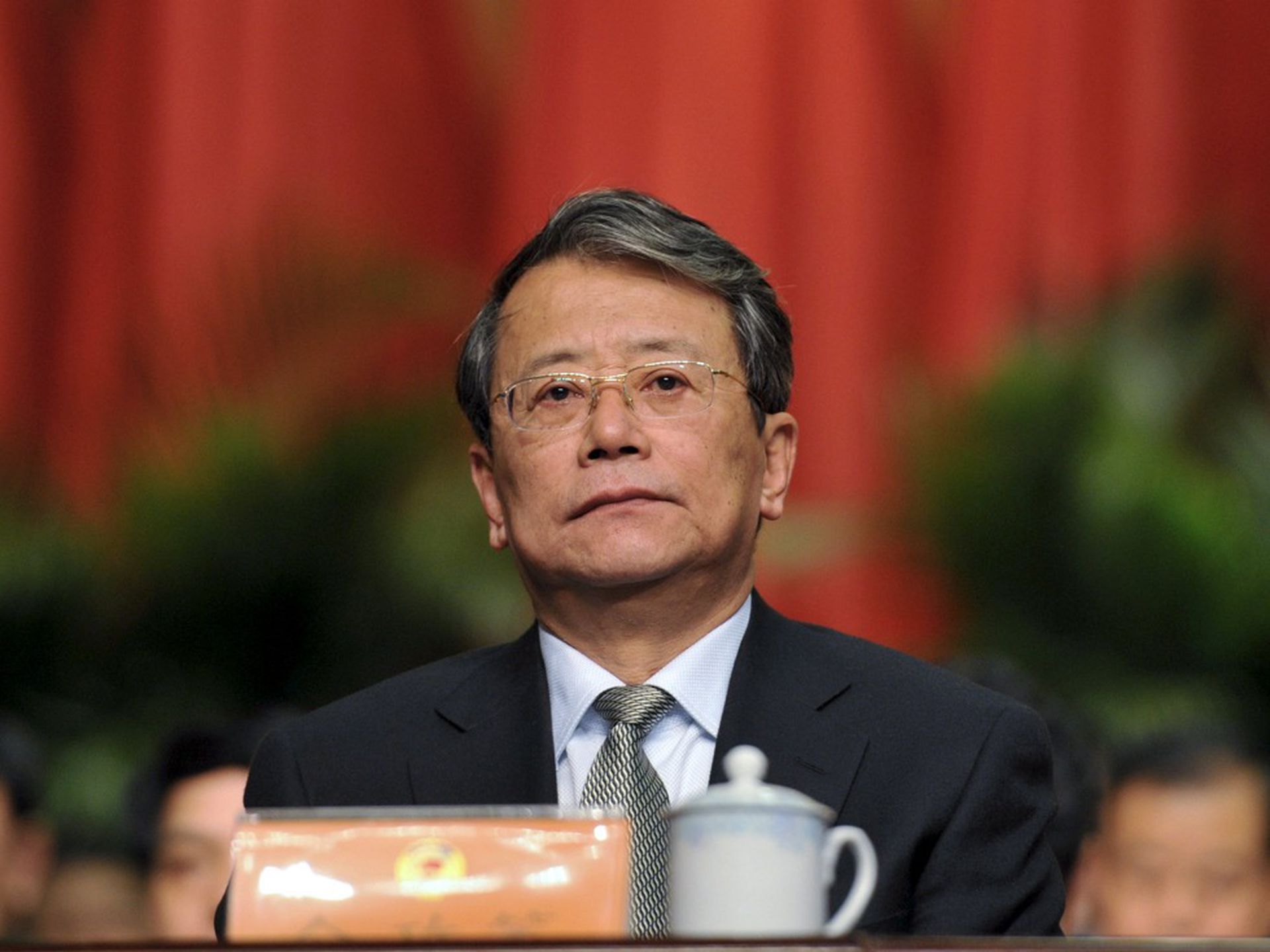 2013年1月22日,担任山西省政协副主席的令政策参加了在太原召开的会议。(路透社)