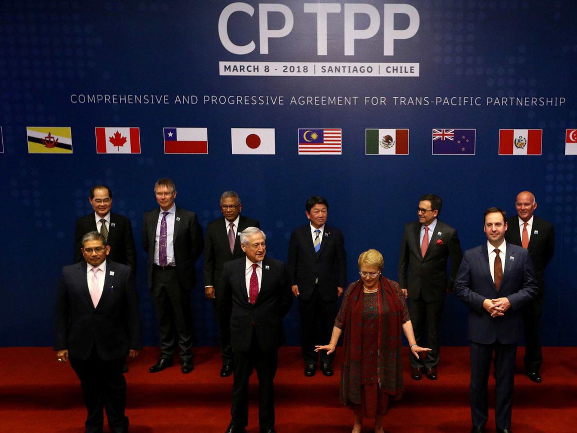 2018年3月8日，11个成员国的代表在智利圣地亚哥举行CPTPP签约仪式。（视觉中国）